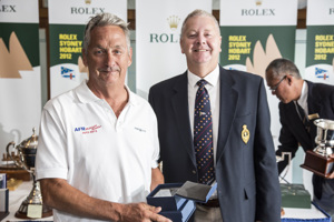 Bob Thomas, AFR Midnight Rambler receives the trophy for second IRC Division 2