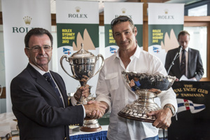 Gordon Maguire, Loki's Sailing master, accepts the George Barton Trophy (1st IRC Div 1) and City of Hobart Trophy (2nd overall IRC) and Bass Strait Cup