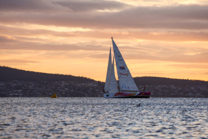 Derry~Londonderry~Doire is the first to sail up the Derwent river as a part of the Clipper Round the World race, a category of the Sydney to Hobart yacht race at Constitution Dock in Hobart, Monday, Dec. 30, 2013. (AAP Image/Heath Holden) NO ARCHIVING, EDITORIAL USE ONLY