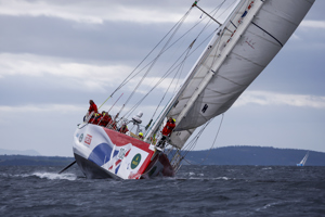 Team Great Britain make their way towards Constitition Dock as a part of the Clipper Round the World race, a category of the Sydney to Hobart yacht race at Constitution Dock in Hobart, Monday, Dec. 30, 2013. (AAP Image/Heath Holden) NO ARCHIVING, EDITORIAL USE ONLY