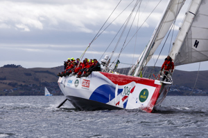 Team Great Britain make their way towards Constitition Dock as a part of the Clipper Round the World race, a category of the Sydney to Hobart yacht race at Constitution Dock in Hobart, Monday, Dec. 30, 2013. (AAP Image/Heath Holden) NO ARCHIVING, EDITORIAL USE ONLY