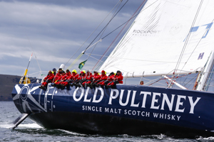 The Old Pulteney boat makes its way towards the finish line at the end of the Clipper Round the World race, a category of the Sydney to Hobart yacht race at Constitution Dock in Hobart, Monday, Dec. 30, 2013. (AAP Image/Heath Holden) NO ARCHIVING, EDITORIAL USE ONLY