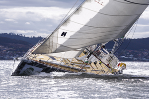 The Old Pulteney boat makes its way towards the finish line at the end of the Clipper Round the World race, a category of the Sydney to Hobart yacht race at Constitution Dock in Hobart, Monday, Dec. 30, 2013. (AAP Image/Heath Holden) NO ARCHIVING, EDITORIAL USE ONLY