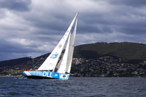 One DLL crew head up the Derwent River towards the line at the end of the Clipper Round the World race, a category of the Sydney to Hobart yacht race at Constitution Dock in Hobart, Monday, Dec. 30, 2013. (AAP Image/Heath Holden) NO ARCHIVING, EDITORIAL USE ONLY