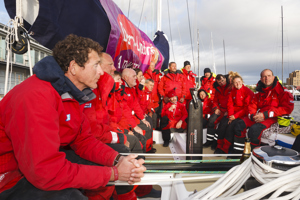 The crew of Derry~Londonderry~Doire celebrate being the first to sail up the Derwent river as a part of the Clipper Round the World race, a category of the Sydney to Hobart yacht race at Constitution Dock in Hobart, Monday, Dec. 30, 2013. (AAP Image/Heath Holden) NO ARCHIVING, EDITORIAL USE ONLY