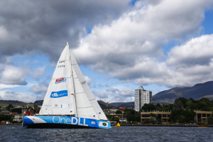 One DLL crew head up the Derwent River towards the line at the end of the Clipper Round the World race, a category of the Sydney to Hobart yacht race at Constitution Dock in Hobart, Monday, Dec. 30, 2013. (AAP Image/Heath Holden) NO ARCHIVING, EDITORIAL USE ONLY