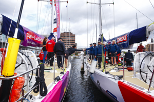 Derry~Londonderry~Doire crew are congratulated by Team Great Britain at constitition dock as a part of the Clipper Round the World race, a category of the Sydney to Hobart yacht race at Constitution Dock in Hobart, Monday, Dec. 30, 2013. (AAP Image/Heath Holden) NO ARCHIVING, EDITORIAL USE ONLY