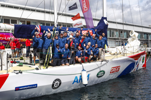 Great Britain crew celebrate at Constitition Dock as a part of the Clipper Round the World race, a category of the Sydney to Hobart yacht race at Constitution Dock in Hobart, Monday, Dec. 30, 2013. (AAP Image/Heath Holden) NO ARCHIVING, EDITORIAL USE ONLY