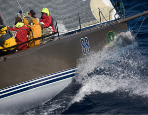 The crew of Goldfinger clean up after a sail change