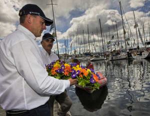 CYCA Commodore Matt Allen and RYCT Commodore Clive Simpson laying the commemorative wreath for the 6 sailors lost in 1998 and for all others lost at sea as a result of undertaking a Hobart race.