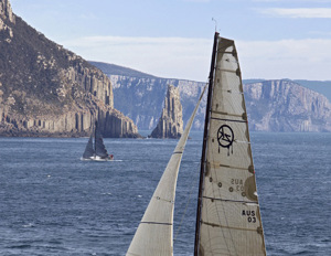 Matt Allen's Ichi Ban sails near Alan Brierty's Limit in the 64th Rolex Sydney to Hobart Yacht Race.