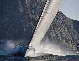 Ludde Ingvall's 90ft maxi YuuZoo, passing Tasman Island