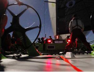 Craig Ellis' Future Shock sailing under a moonlit sky