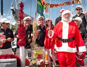 Santa Claus and the crew from Outrageous Fortune celebrate Christmas in Australia