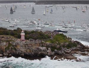 Spectators watch the fleet from South Head