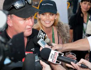 Anthony Bell is joined by wife Kelly Landry dockside as he addresses the media