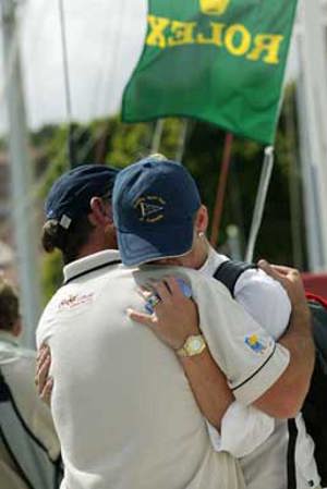 Well wishers farewell crew on the CYCA marina.
