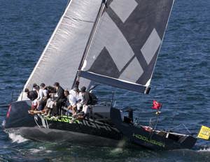 Marcus Blackmore's TP52 Hooligan in a stoush with other TP52s Ragamuffin and Wot Eva