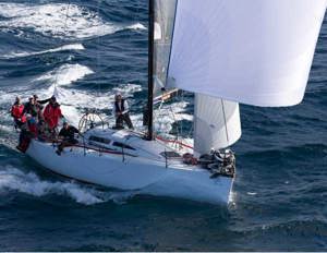 Edward Cox at the helm of Minerva, the DK43 owned by his father Tim Cox