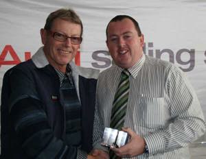 Ray Roberts receiving his Divisional trophy from Nathan, Audi Centre Gold Coast