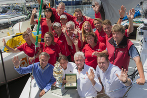 Roger Hickman, Owner Wild Rose, and crew receive the Tattersall's Cup and a Rolex Timepiece.
Front row: Jean-Nöel Bioul, Rolex SA, John Cameron, Commodore Cruising Yacht Club of Australia, Roger Hickman, Richard Batt,  Commodore Royal Yacht Club of Tasmania.