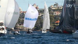 Some of the back markers proceeding down Sydney Harbour towards the sea