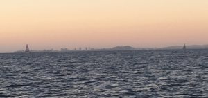 Wild Oats XI and Black Jack soon after passing Burleigh Heads on the way to the finish