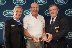 Rob Mundle collecting the 2017 line honours winner's prize on behalf of Wild Oats