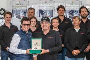 Patrick Boutellier, General Manager of Rolex Australia, presents Line Honours winner Jim Cooney, owner and skipper of LDV Comanche with a Rolex Timepiece