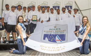The crew of Ichi Ban with their Overall Winner flag