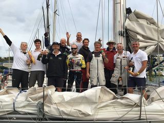 The crew of the beautiful Swan 65 Eve at the dock in Noumea