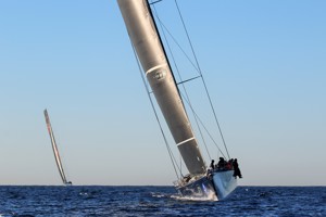 Black Jack with Wild Oats XI tucked behind on the way to the line