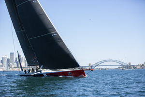 Comanche leads the fleet up Sydney Harbour