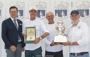 Patrick Boutellier, General Manager of Rolex Australia, with owner Philip Taylor and a crew member of Alive and CYCA Commodore Paul Billingham