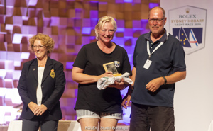 RYCT Commodore Tracy Matthews presenting the trophy for 1st in the Cruising Division to Relish IV (LeeAnn Lynch)