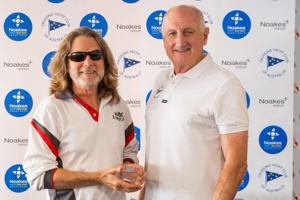 Noel Cornish presenting PHS Corinthian 3rd place trophy to Les Goodridge, skipper of Wax Lyrical