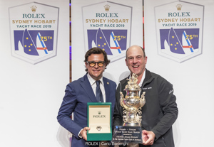 Prizegiving ceremony - Overall winner Ichi Ban.  Owner Matt Allen with Rolex Australia General Manager Patrick Boutellier.