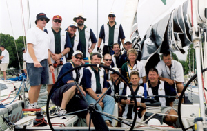 Infinity III Sydney Hobart crew 2002 - (l to r from front) Peter Newell, Martin James, Tim Molchanoff, Pip Lavis, Louise Stevenson, Les Goodridge, Fred Etter, Ian Potter, Andrew Smith, Peter Bush, Geoff Lavis, Brett Smith, Adam Kilkeary, Federico Pogliano, Chris Flanagan