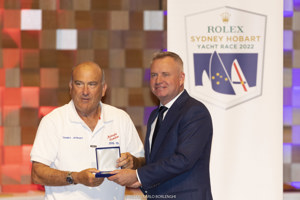 Ed Psaltis (owner/skipper, Midnight Rambler) collects his 40-race medallion from Jeremy Rockliff (Premier of Tasmania).