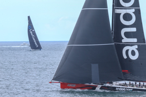 Cabbage Tree Island Race 2023 - Andoo Comanche leading LawConnect to the finish in Sydney Harbour