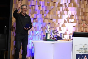 Geoff Bauchop with his '25 Race' medallion.  He sailed his 25th race on Moneypenny.