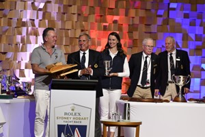 URM Grup, 3rd Over the Line, 2nd IRC Division 0, 2nd IRC Overall (City of Hobart Trophy, Bass Starit Cup and Solo Trophy) - presented to owner Anthony Johnston by CYCA Commodore Lane
