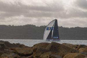 URM Group coming through the heads as she approaches the finish to take line honours in the Bird Island Race.   Image: CYCA | Vito Feremans