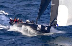 Whisper passing North Head.   Image courtesy Bow Caddy Media.