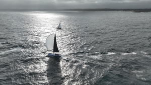 Pretty Woman heading South, passing Quetzalcoatl heading to Bird Island.   Image courtesy High Impressions Media.