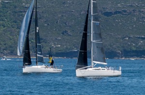 The Shepherd Centre and Disko Trooper_Contender Sailcloth entering Sydney Harbour together.   Image: CYCA | David Hislop