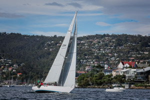 Three time overall winner Love & War in River Derwent closing the finish line.     Image: CYCA | Salty Dingo