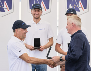 The Honourable Jeremy Rockliff, Premier of Tasmania, presenting an Overall Winner Medallion to Sam Haynes, skipper of Celestial V70.    