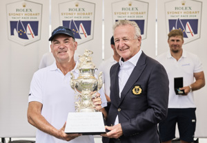 CYCA Vice Commodore David Jacobs presenting the Tattersall Cup to Sam Haynes, skipper of Celestial V70.     
