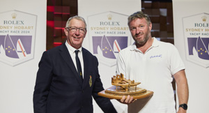 Alex Nolan of Celestial V70, Navigator of Winning Yacht (Bill Owen Trophy) - presented by RYCT Commodore Stephen McCullum.    